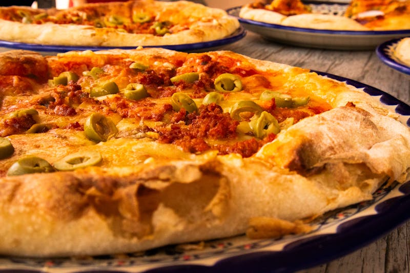 Seasonal bruschetta on toasted sourdough with heirloom tomatoes